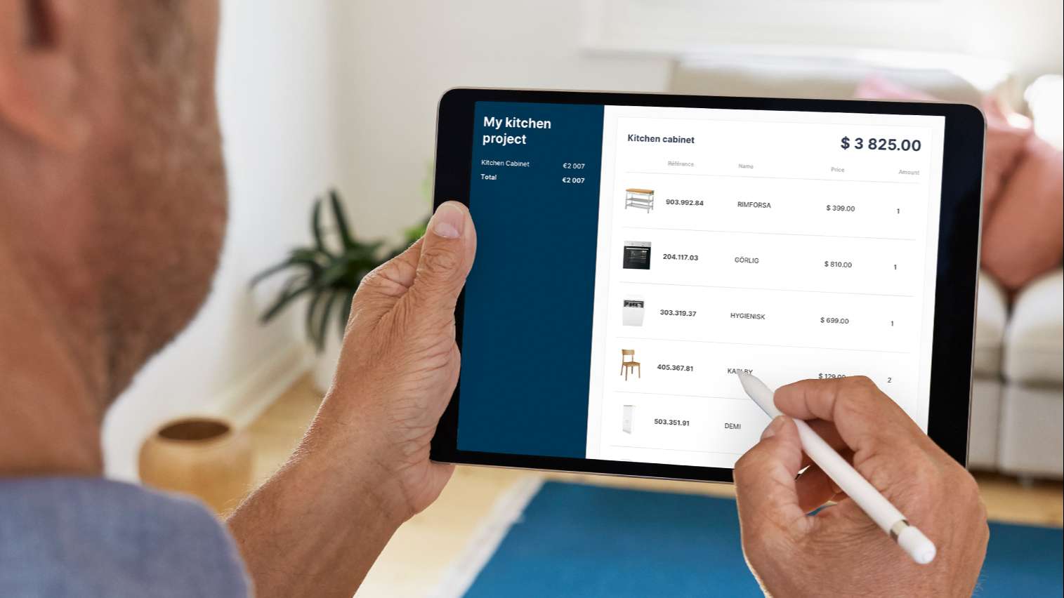 man updating his kitchen project price list on a tablet with the HomeByMe for Kitchen Retailers 3D planning solution