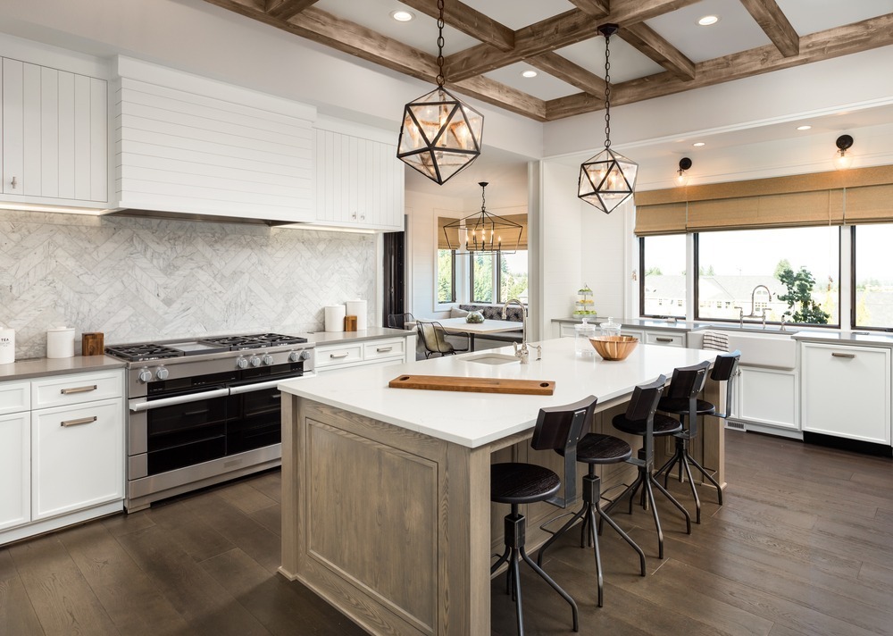 large kitchen with white countertop island