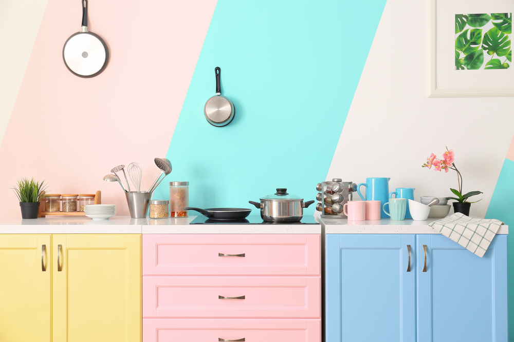 colorful kitchen with different colored cabinets